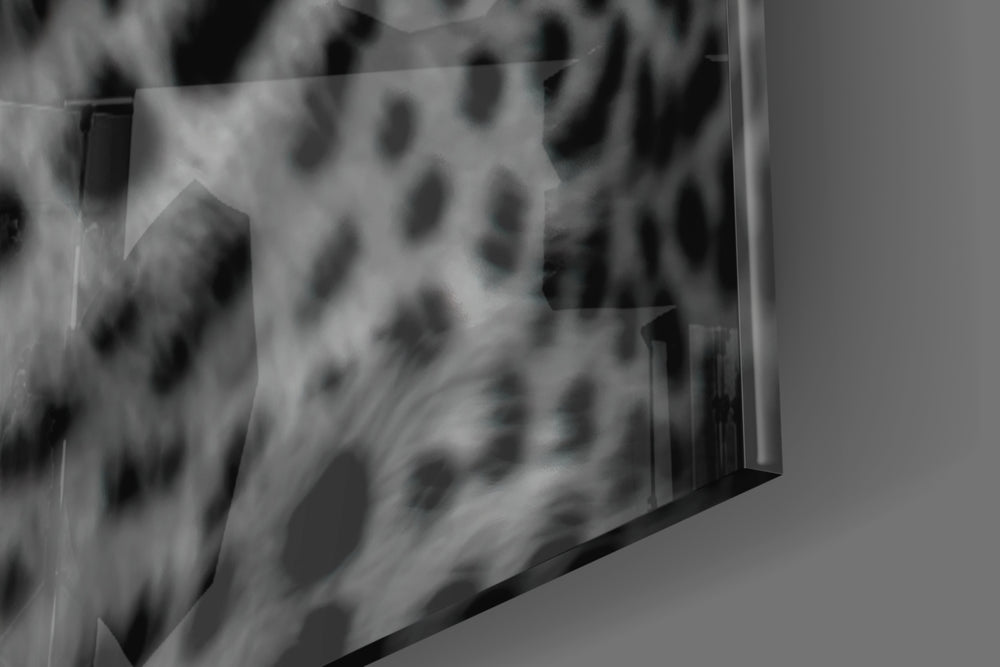 Leopard artwork anchoring a wall with dark primal palette