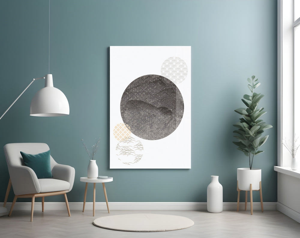 Black Moon glass wall art styled above a bed in a bedroom