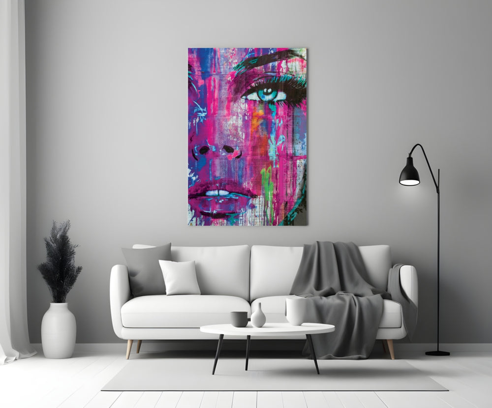 Woman Eye close-up showing teal iris amid magenta cobalt and jade drips on newsprint