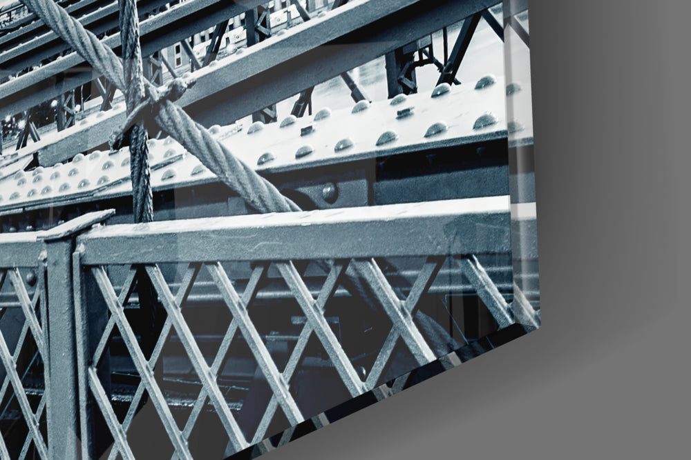 Brooklyn Bridge artwork anchoring a wall with cool monochrome palette