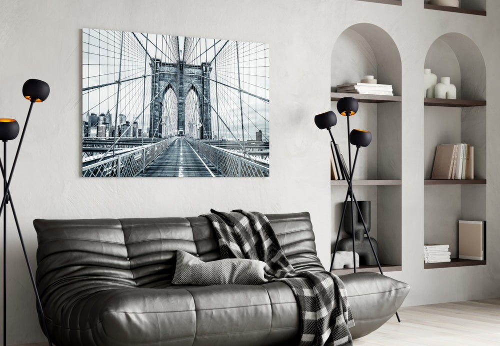Brooklyn Bridge glass wall art styled above a desk in an office