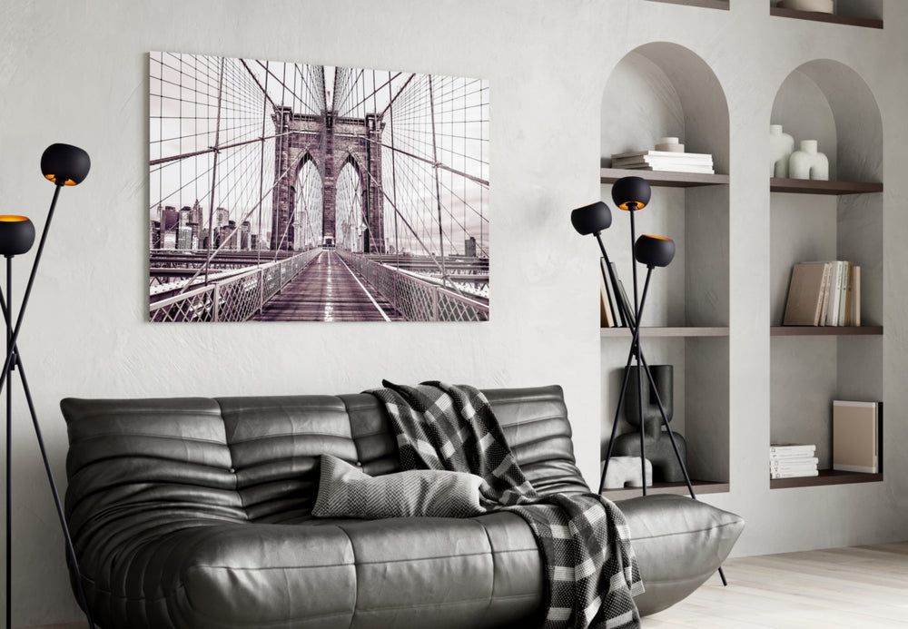 Brooklyn Bridge glass wall art styled above a desk in an office