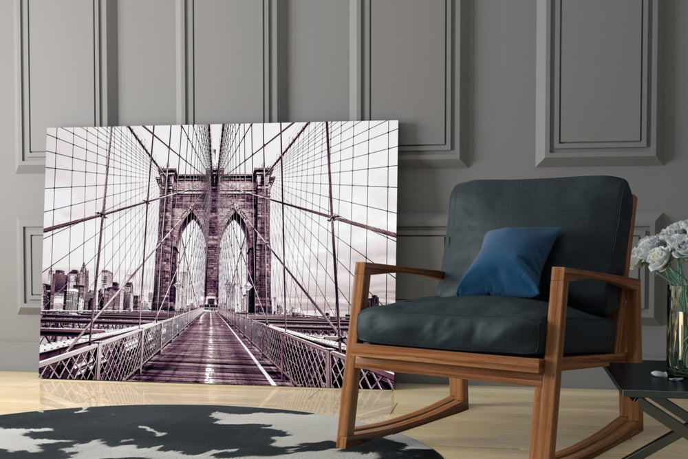 Brooklyn Bridge glass print enhancing a study with cinematic warmth