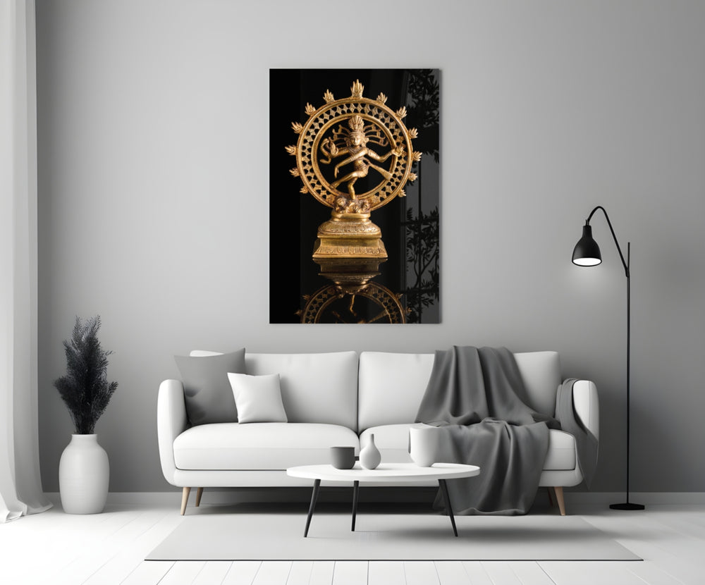 Shiva Nataraja close-up showing brass dancer within flaming halo on polished pedestal
