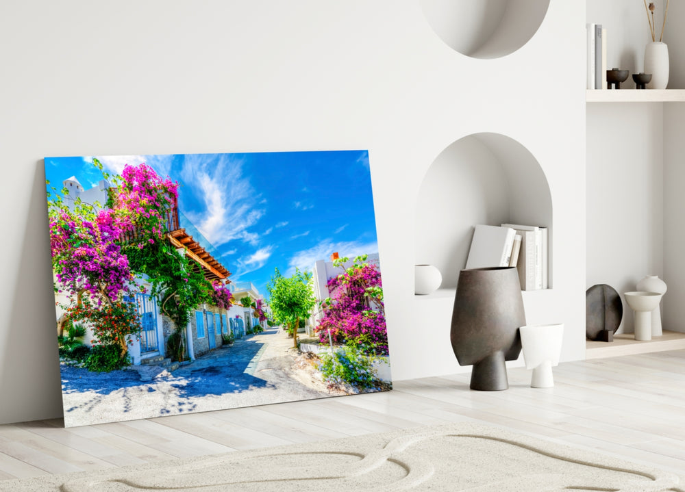 Aegean Beauties close-up showing whitewashed lane with magenta bougainvillea under blue sky