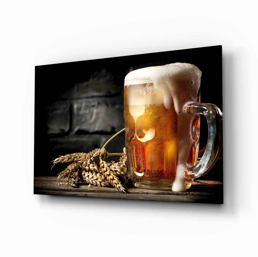 Beer glass wall art displayed above a leather chesterfield in a moody man cave with reclaimed-wood console and brass arc lamp