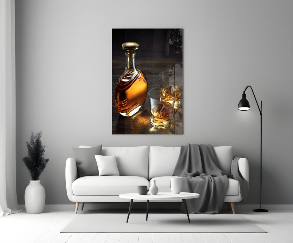 Whiskey close-up showing crystal decanter and two rocks glasses with golden ice on dark planks