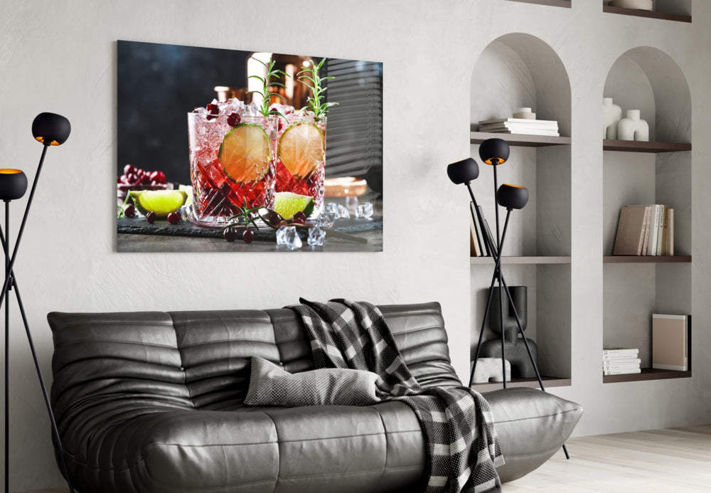 Whiskey glass wall art styled above a sideboard in a home bar