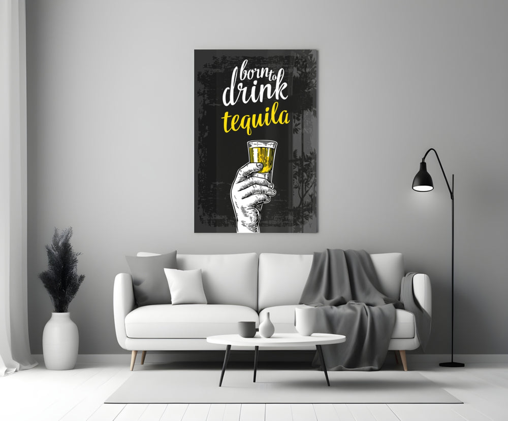 Tequila close-up showing Born to Drink script with hand raising yellow shot
