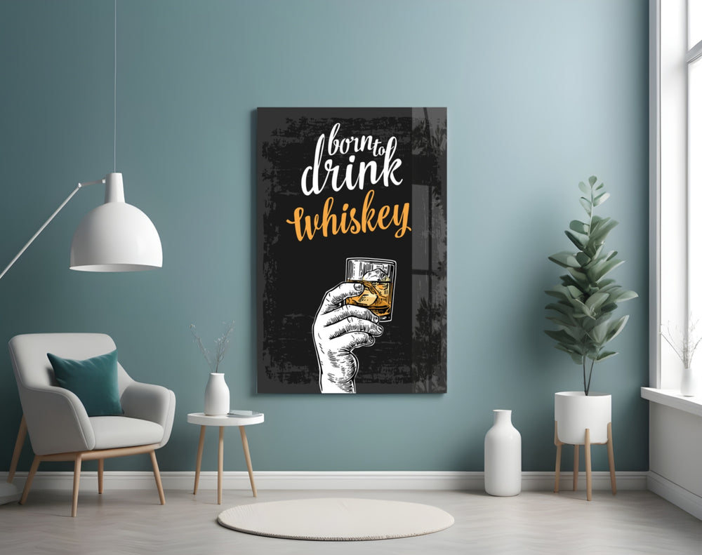 Whiskey glass wall art styled above a sideboard in a home bar