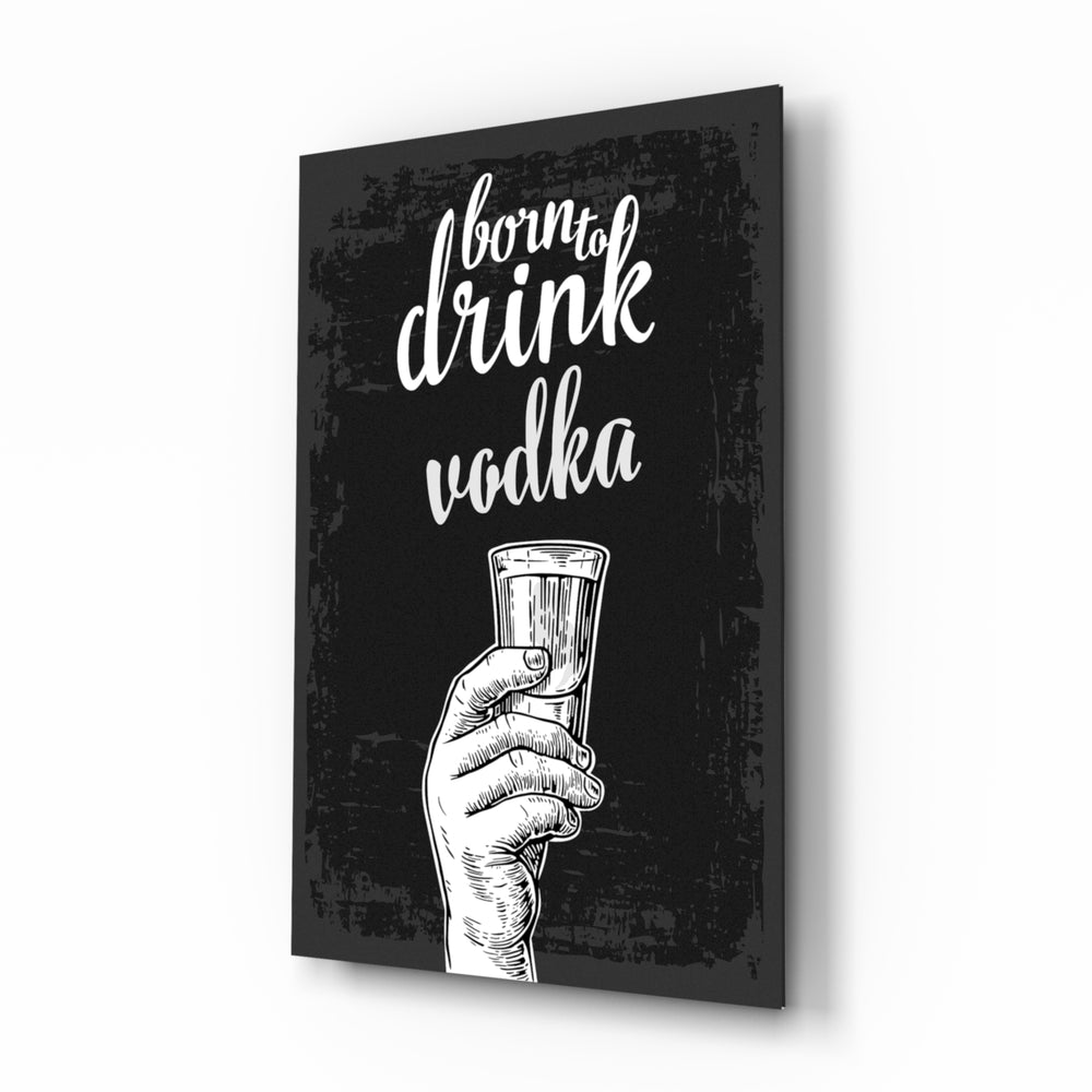 Vodka glass wall art displayed above a leather chesterfield in a moody man cave with reclaimed-wood console and brass arc lamp