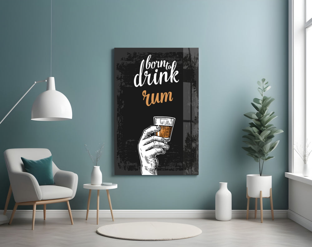 Rum glass wall art styled above a sideboard in a home bar