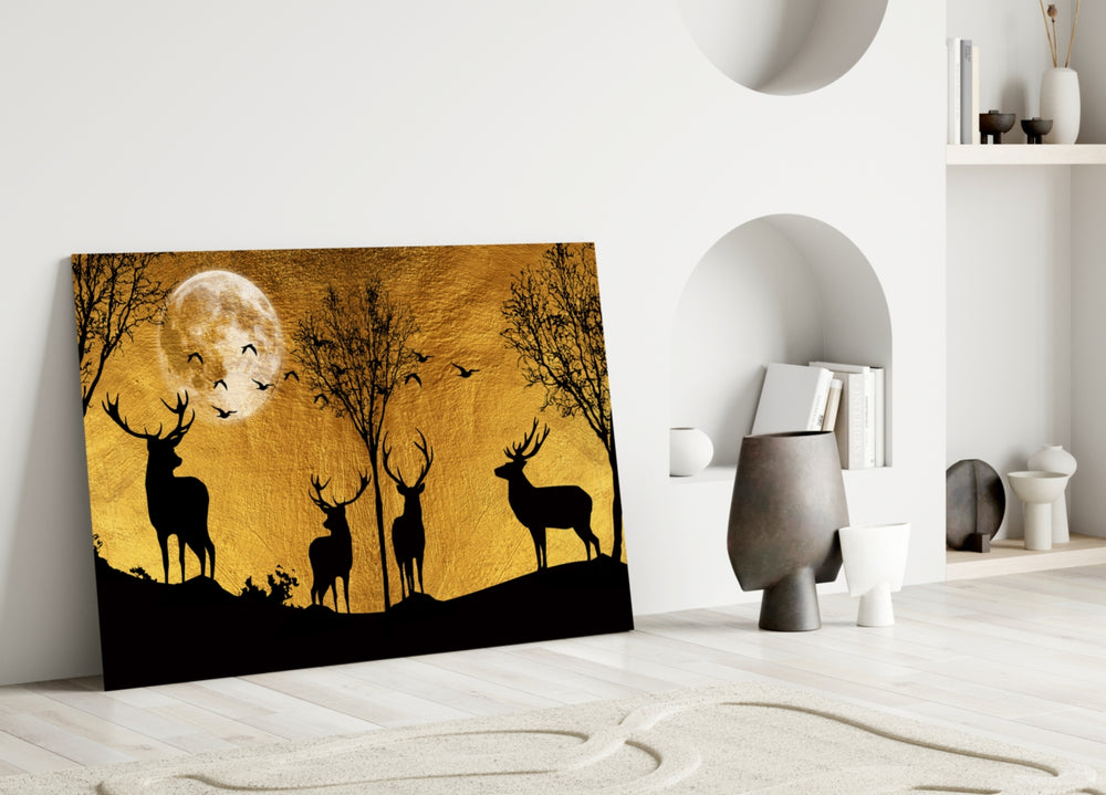Deers close-up showing four stags silhouetted before a textured gold-leaf moon
