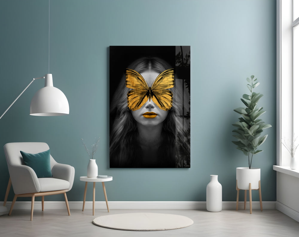 Butterfly Eyes glass wall art styled above a console in a hallway
