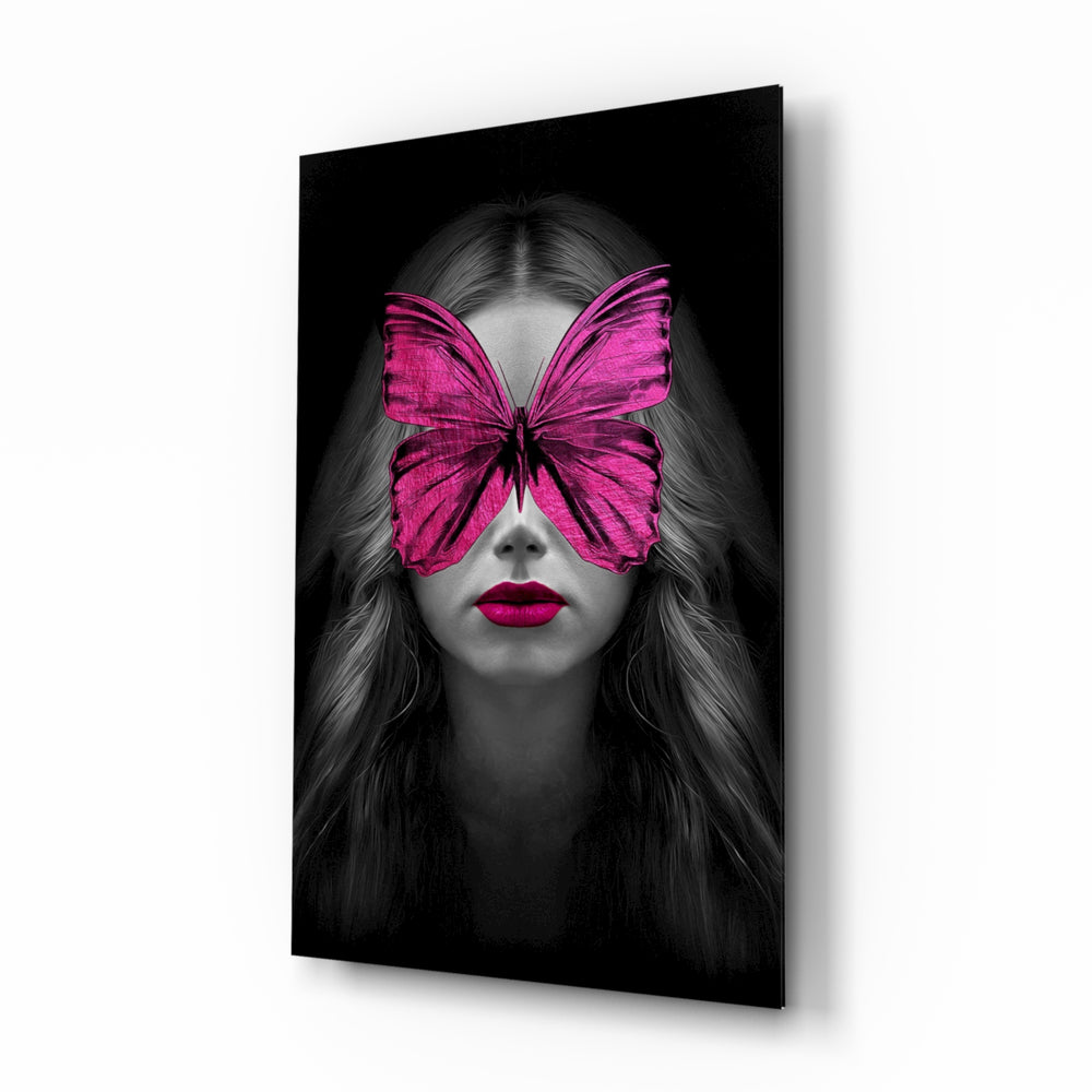 Butterfly Eyes glass wall art displayed above a velvet bed in a moody bedroom with rattan nightstands and brushed-brass sconces