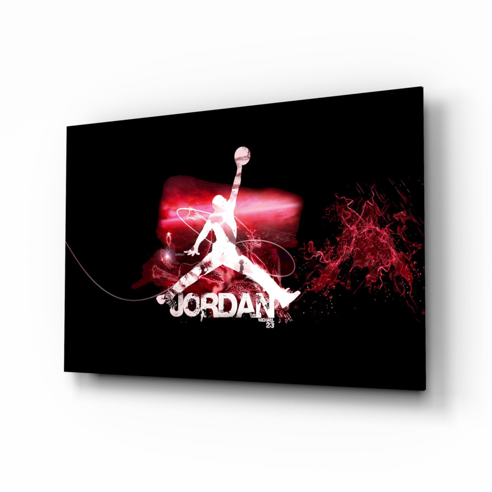 Michael Jordan glass wall art displayed above a black leather sectional in a moody man cave with neon LED strip and matte-black coffee table