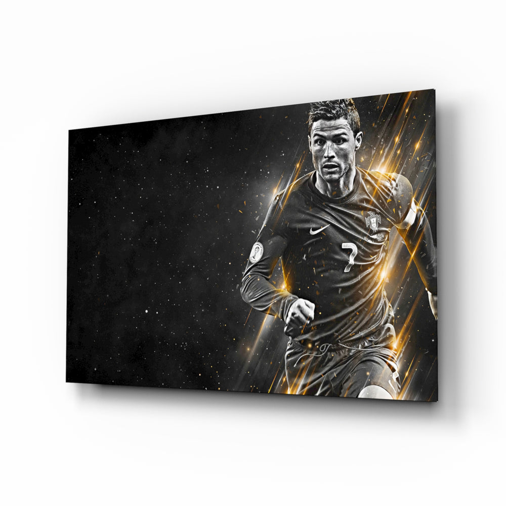 Christiano Ronaldo glass wall art displayed above a leather chesterfield in a moody man cave with reclaimed-wood console and brass arc lamp