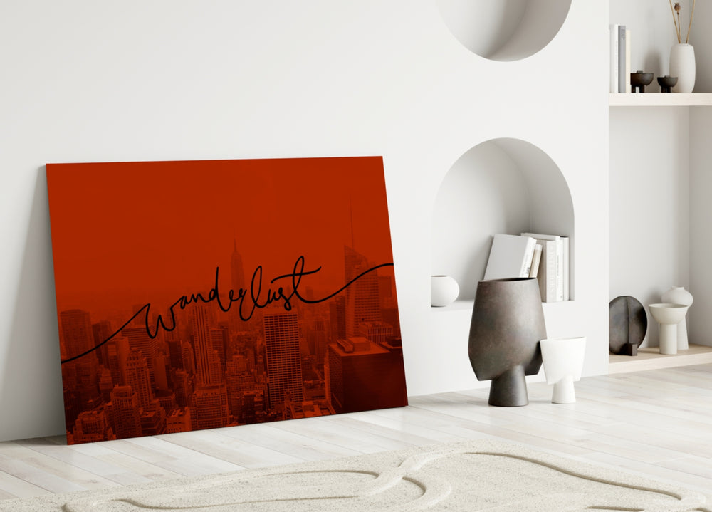 Wanderlust close-up showing flowing cursive across crimson-tinted NYC skyline