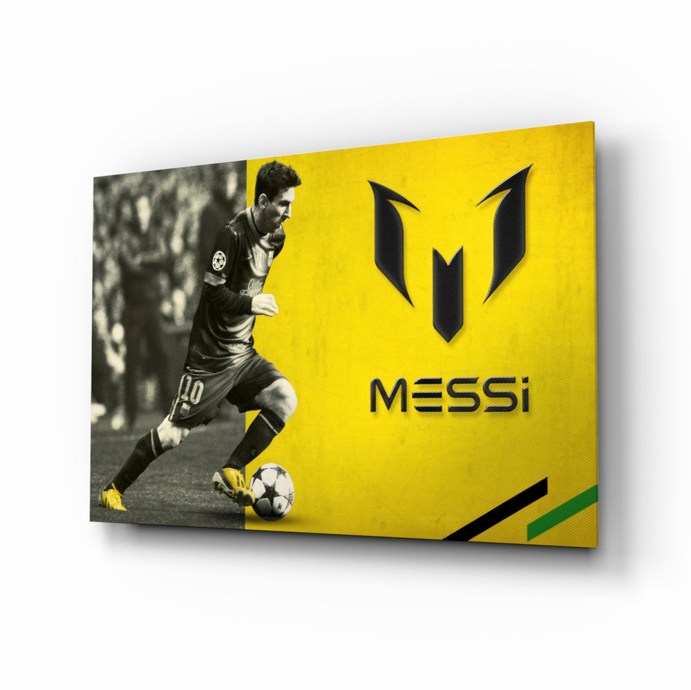 Messi glass wall art displayed above a leather chesterfield in a moody man cave with reclaimed-wood console and brass arc lamp