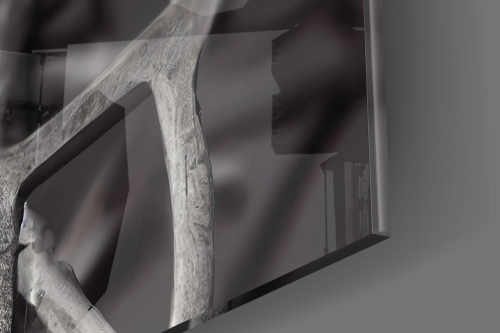 Future Human artwork anchoring a wall with bold monochrome palette