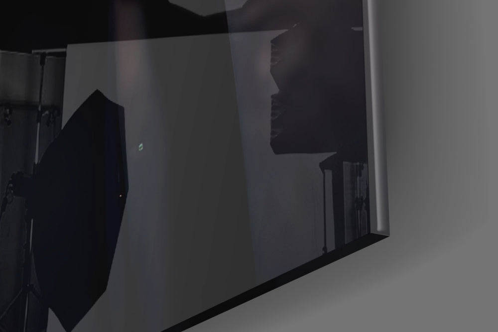 Black Rage artwork anchoring a wall with bold dramatic palette