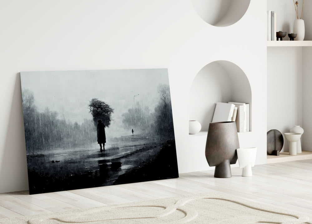 Loneliness close-up showing cloaked figure beneath barren tree in rain