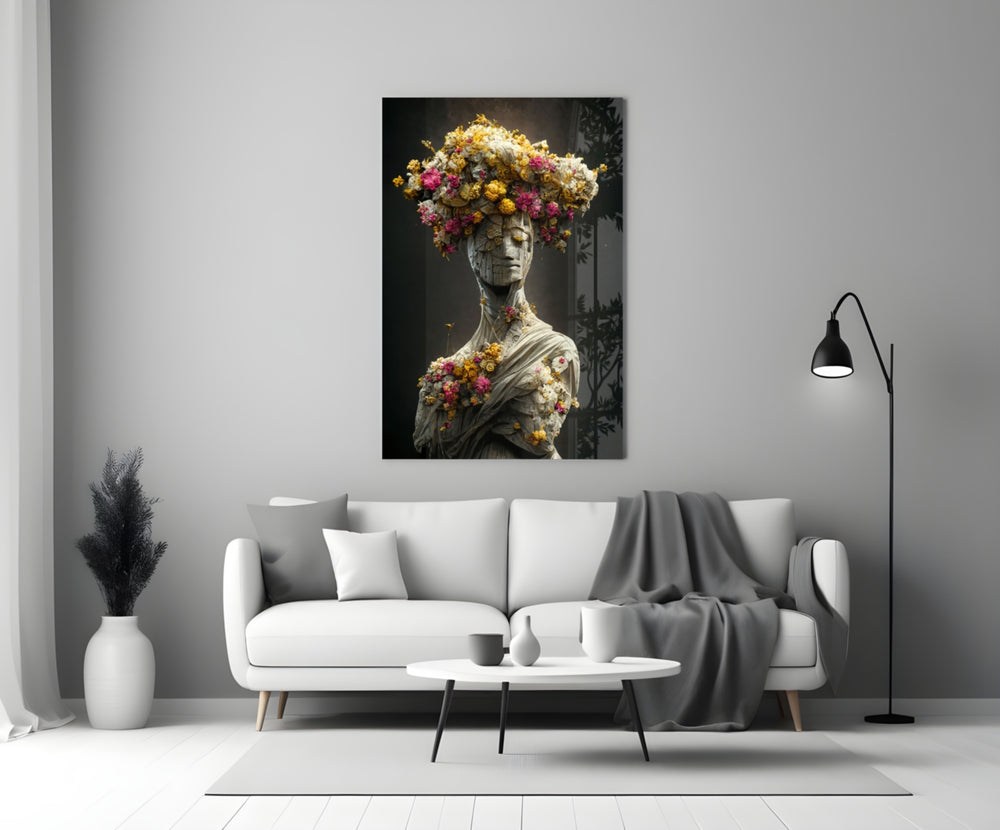 Abandoned Statue close-up showing stone face wrapped in golden and pink dried blossoms