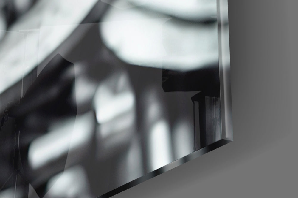 Humachine artwork anchoring a wall with bold monochrome palette