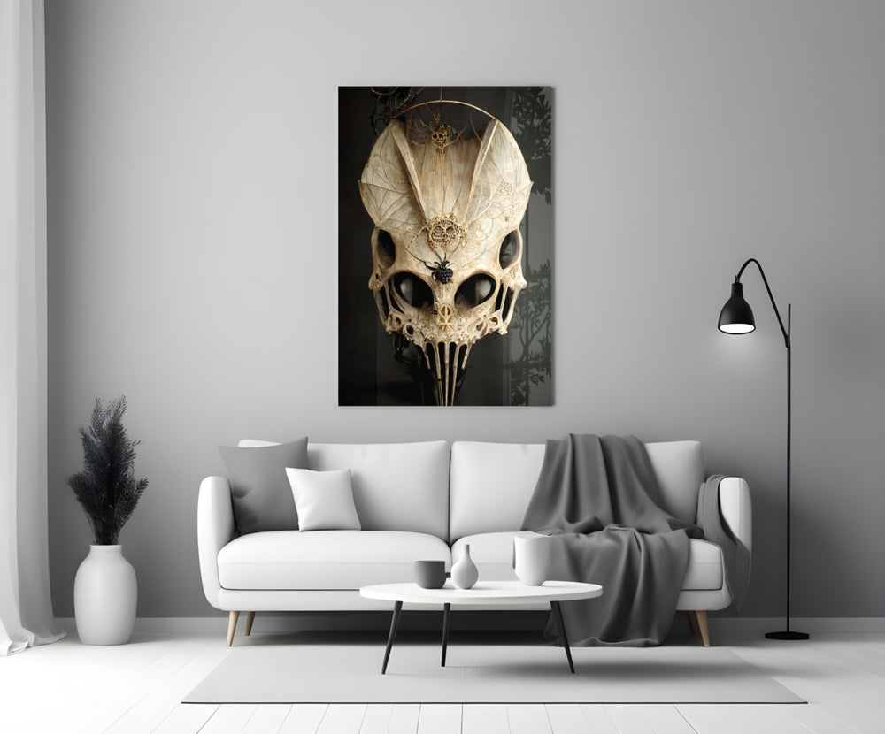 It's Skull close-up showing bone-mask cranium with moth wings and spider