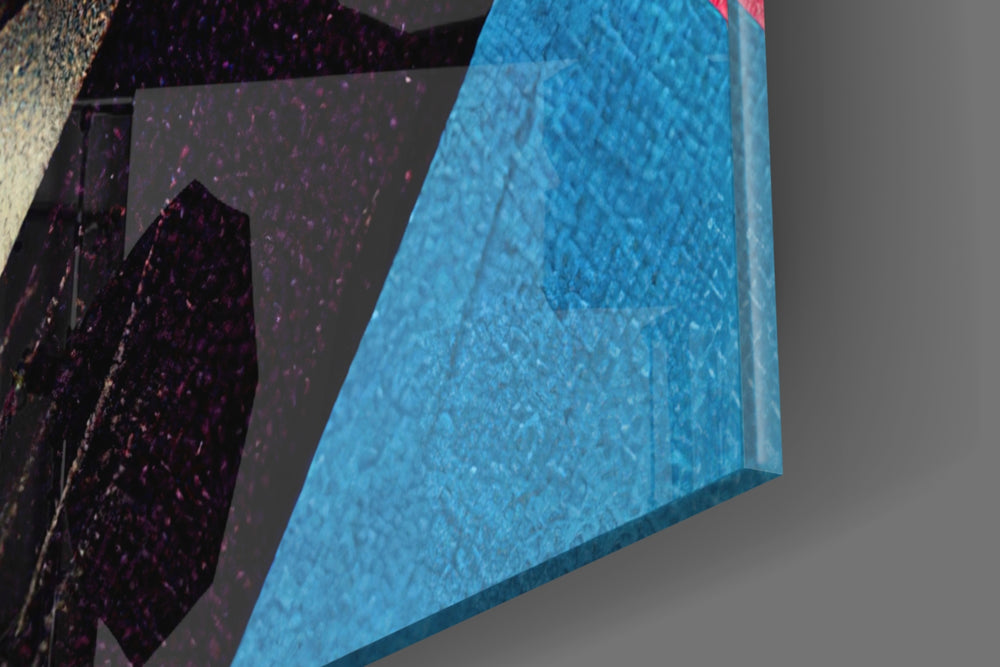 Masked artwork anchoring a wall with bold vibrant palette
