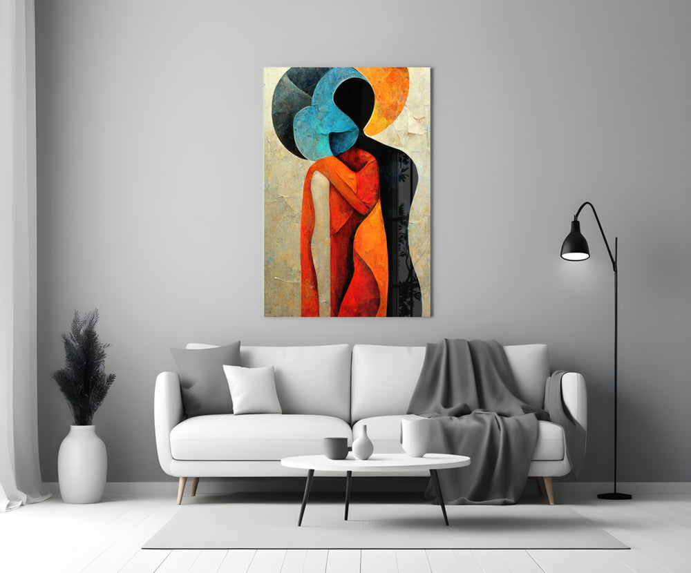 Hug close-up showing cobalt moon-head muse embracing amber-robed figure