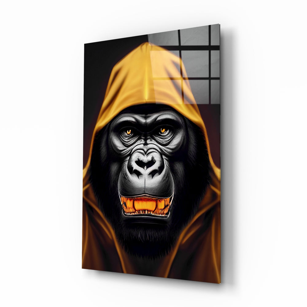 Angry Smile glass wall art displayed above a black leather sectional in a moody man cave with brass sconces