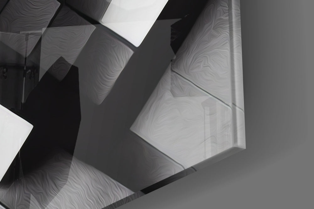 Cubic artwork anchoring a wall with bold monochrome palette