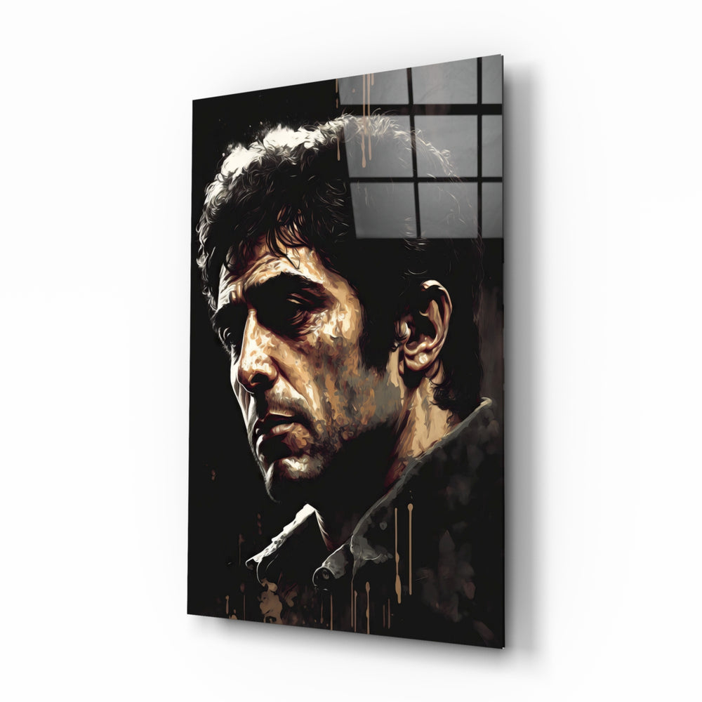 Al Pacino glass wall art displayed above a walnut desk in a moody home office with brass sconces