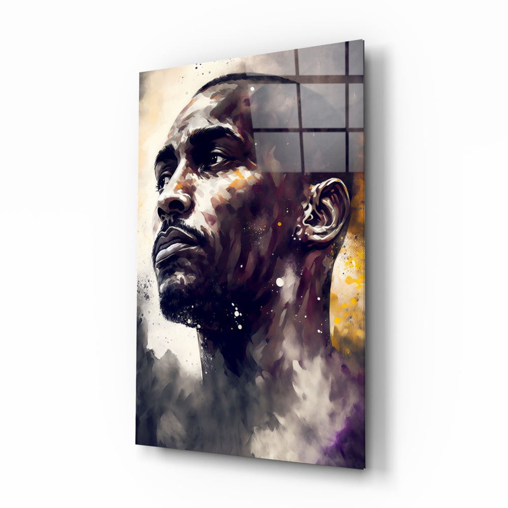 Kobe Bryant glass wall art displayed above a leather sofa in a moody man cave with brass sconces