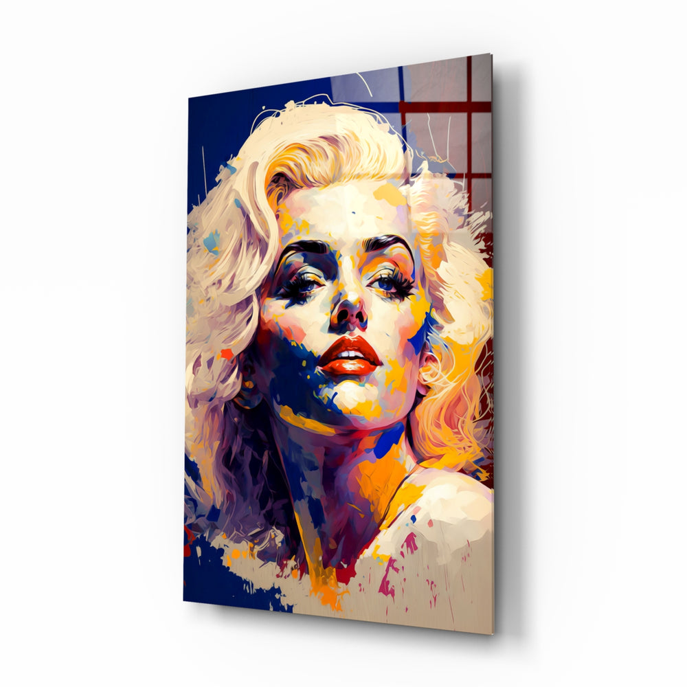 Marilyn Monroe glass wall art displayed above a workbench in a creative studio