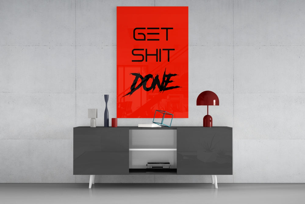 Get Shit Done panel catching lamp light to reveal its brushwork heat