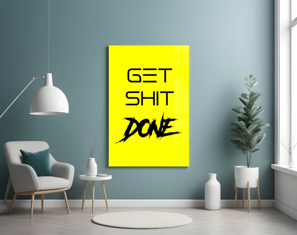 Get Shit Done glass wall art styled above a console in a creative studio