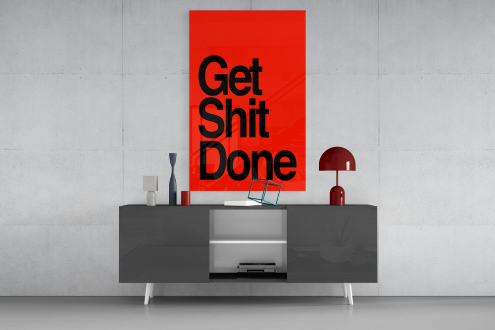 Get Shit Done panel catching lamp light to reveal its bold lettering