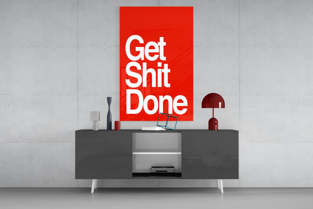 Get Shit Done panel catching lamp light to reveal its bold lettering