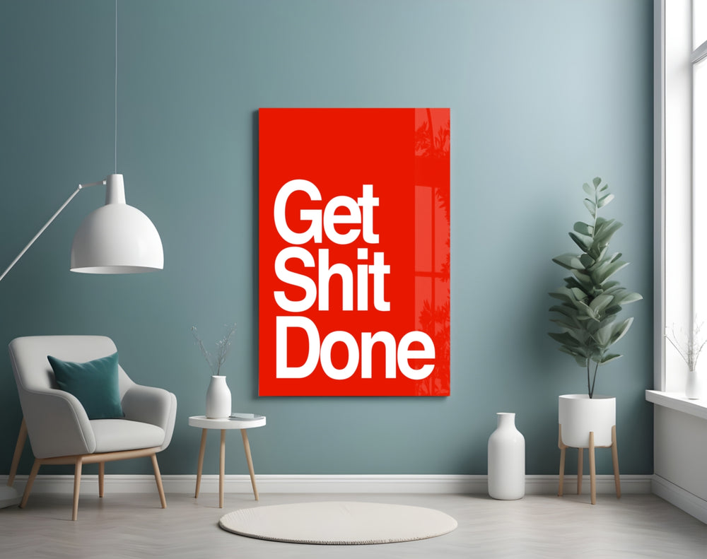 Get Shit Done glass wall art styled above a console in a startup lounge