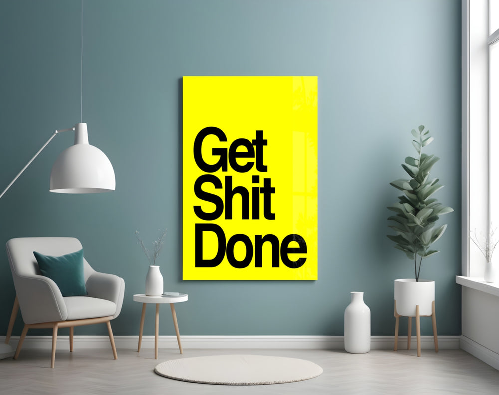Get Shit Done glass wall art styled above a console in a creative studio