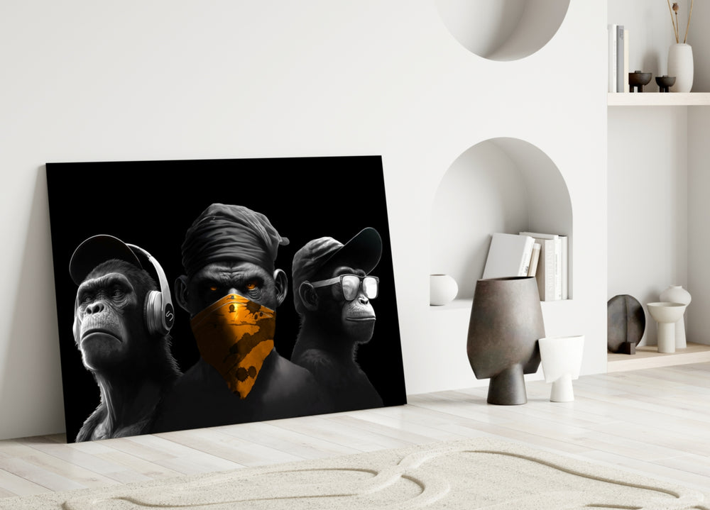 Three chrome apes close-up showing headphones, amber bandana and clear glasses