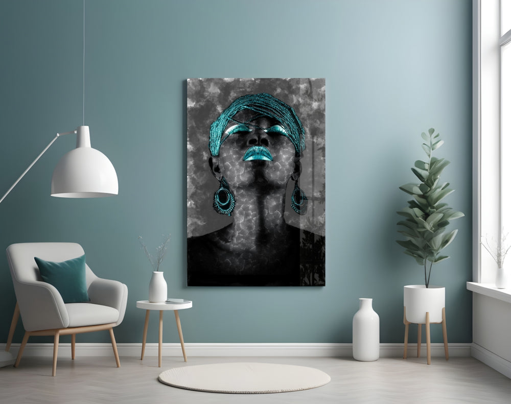 Women glass wall art styled above a velvet bench in a salon