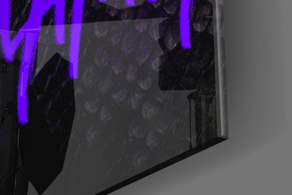 Basketball legend artwork anchoring a wall with violet-and-onyx palette