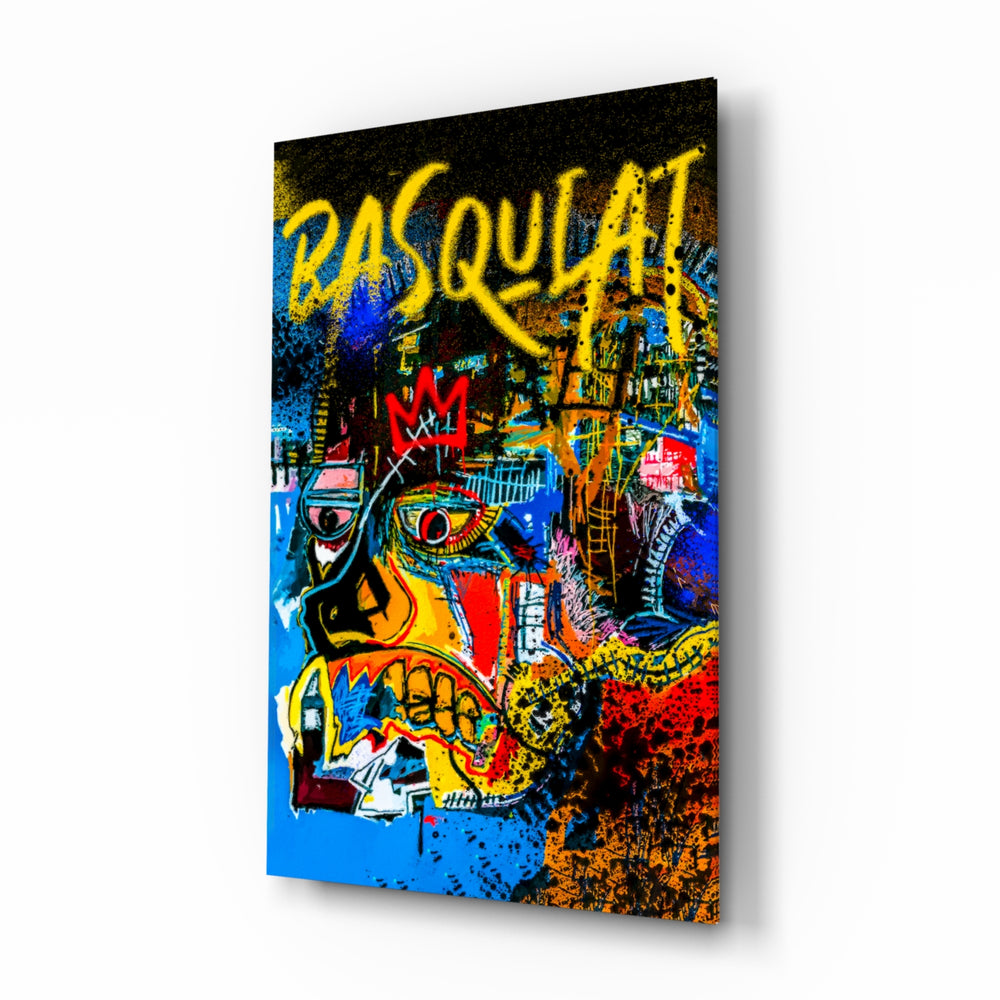 Basquiat-style glass wall art displayed above a workbench in a creative studio