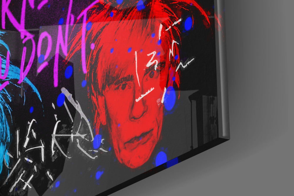 Self-portrait grid artwork anchoring a wall with neon-and-onyx palette