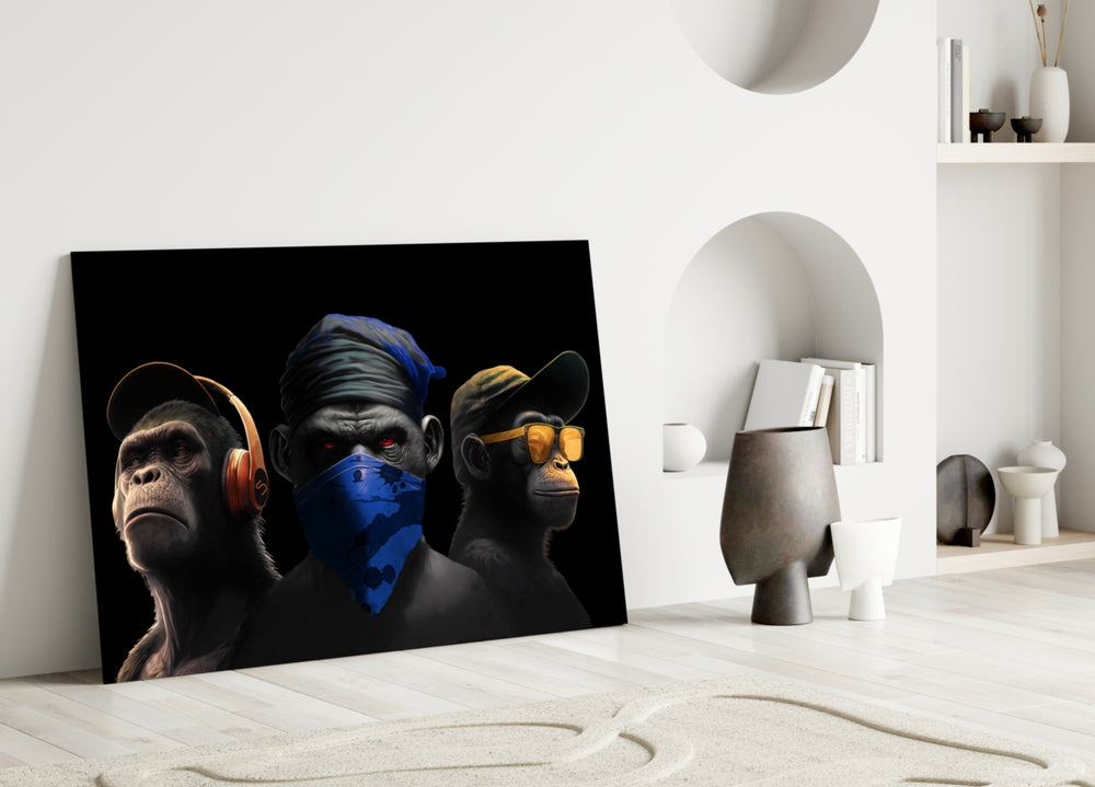Three apes close-up showing coral headphones, blue bandana and amber glasses