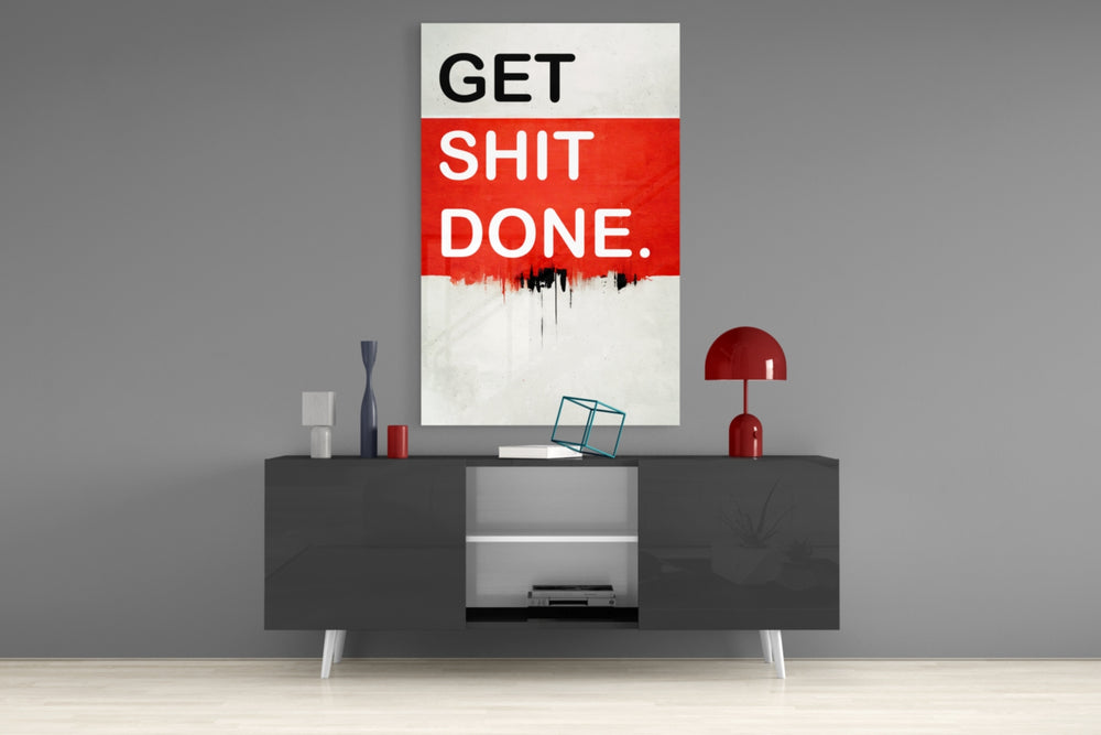 Get Shit Done panel catching lamp light to reveal its bold lettering