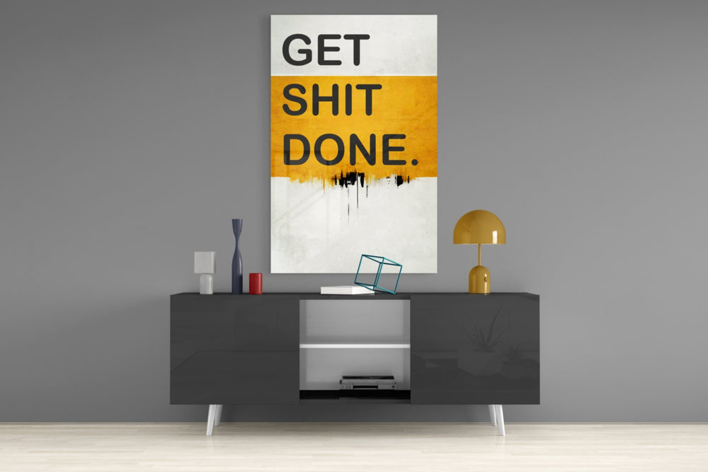 Get Shit Done panel catching lamp light to reveal its bold lettering